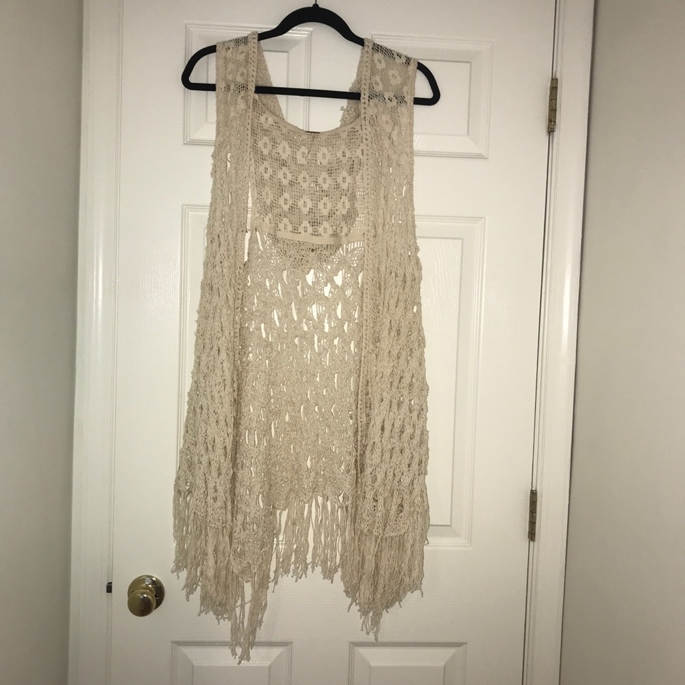 Free people crocheted vest with hood.
